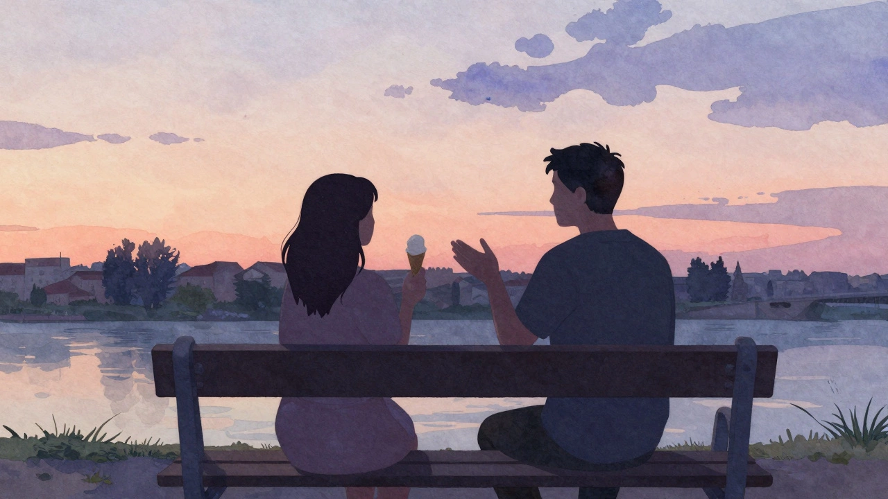 Two silhouettes on a riverside bench at sunset, sharing a quiet moment of companionship.